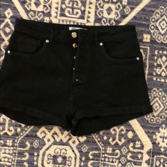 cuffed black shorts